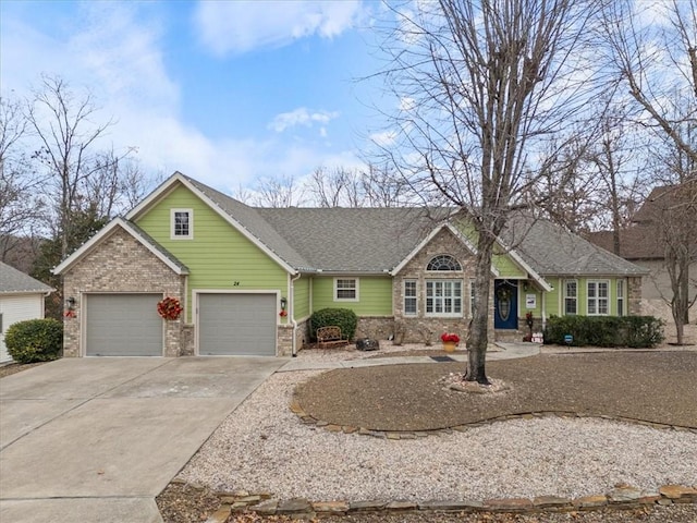 single story home featuring a garage