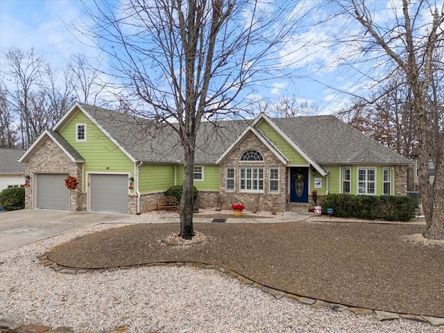 view of front of property with a garage