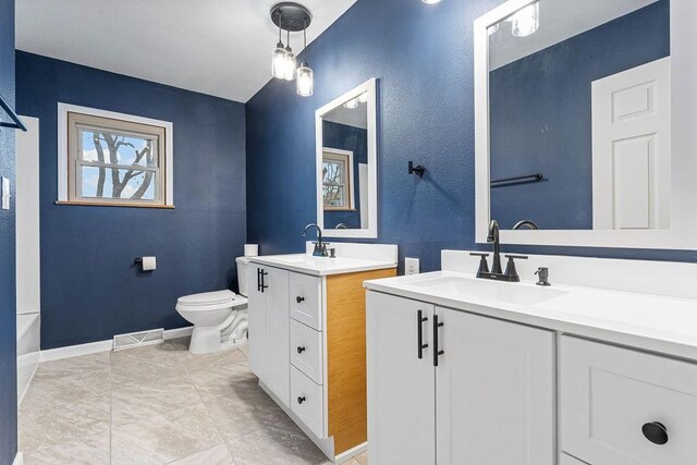 103 Spring St, Cassville, MO 65625 - bathroom featuring vanity and toilet