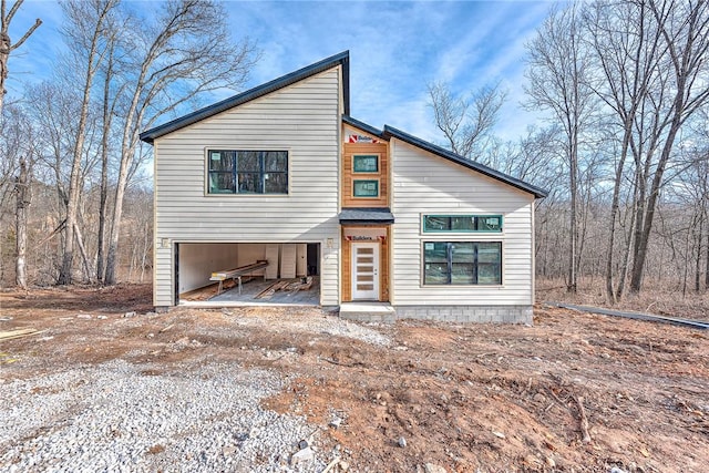 modern home featuring a garage