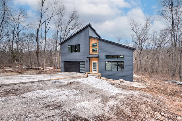 view of front of home with a garage