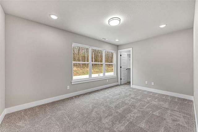 117 Kinross Dr, Bella Vista, AR 72715 - carpeted spare room with baseboards and recessed lighting