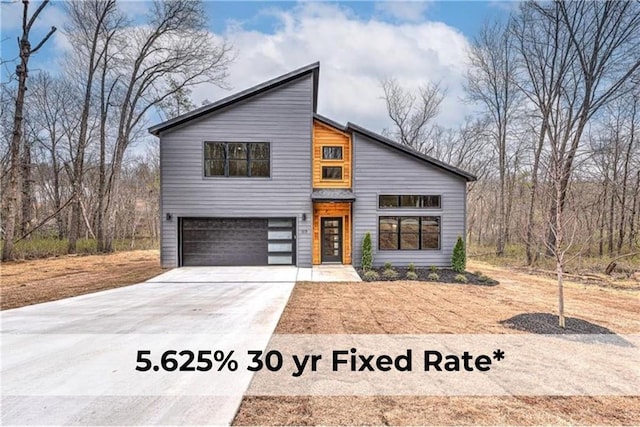 117 Kinross Dr, Bella Vista, AR 72715 - contemporary home with a garage and driveway