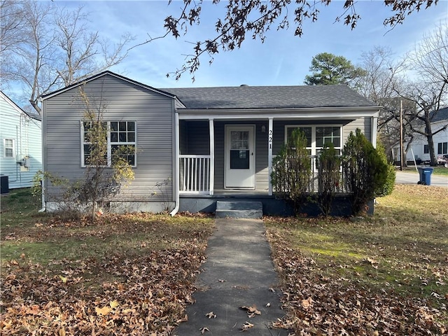 bungalow featuring central AC and a porch