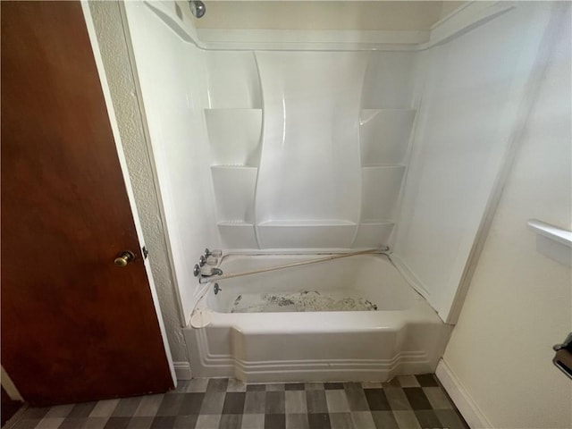 bathroom with shower / bath combination