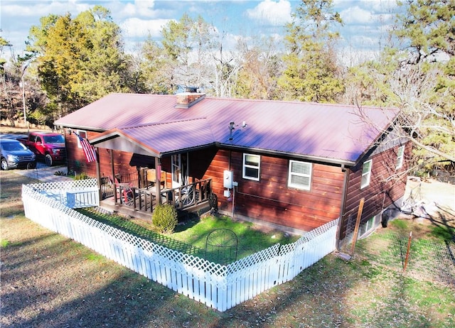 back of property featuring a porch