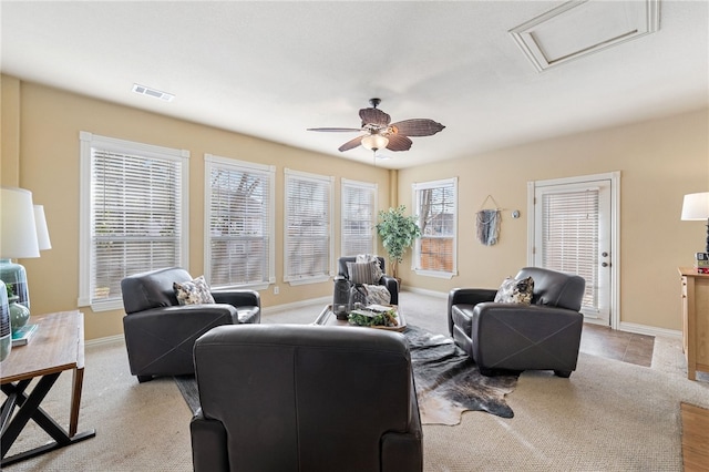 living room featuring ceiling fan