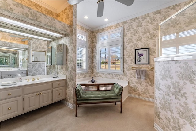 bathroom featuring crown molding, vanity, and ceiling fan