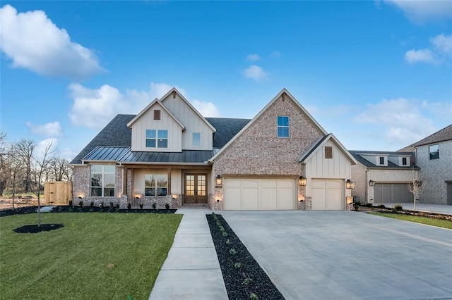 4201 88th St, Bentonville, AR 72718 - view of front facade with board and batten siding, french doors, a standing seam roof, and concrete driveway
