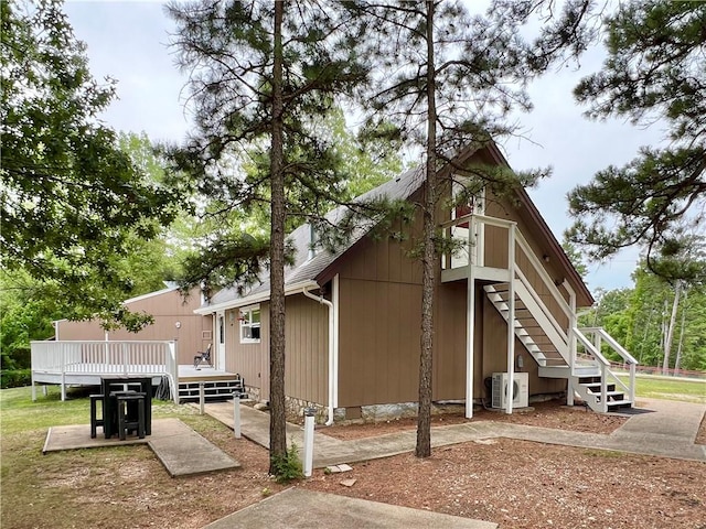 426 Van Buren, Eureka Springs, AR 72632 - view of side of property featuring a wooden deck and stairs