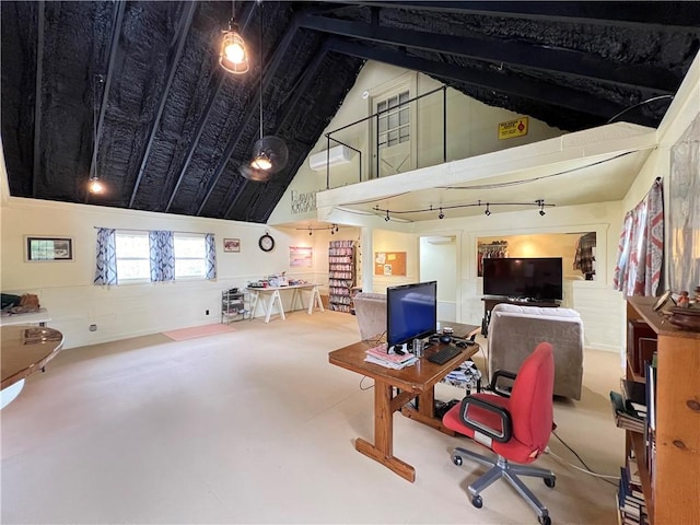 office space with high vaulted ceiling