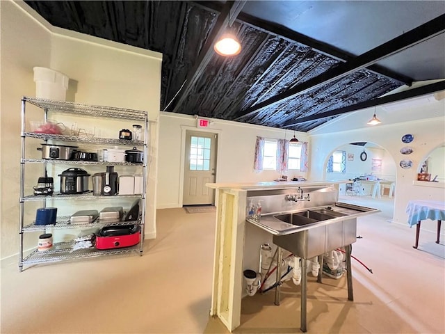 kitchen with lofted ceiling