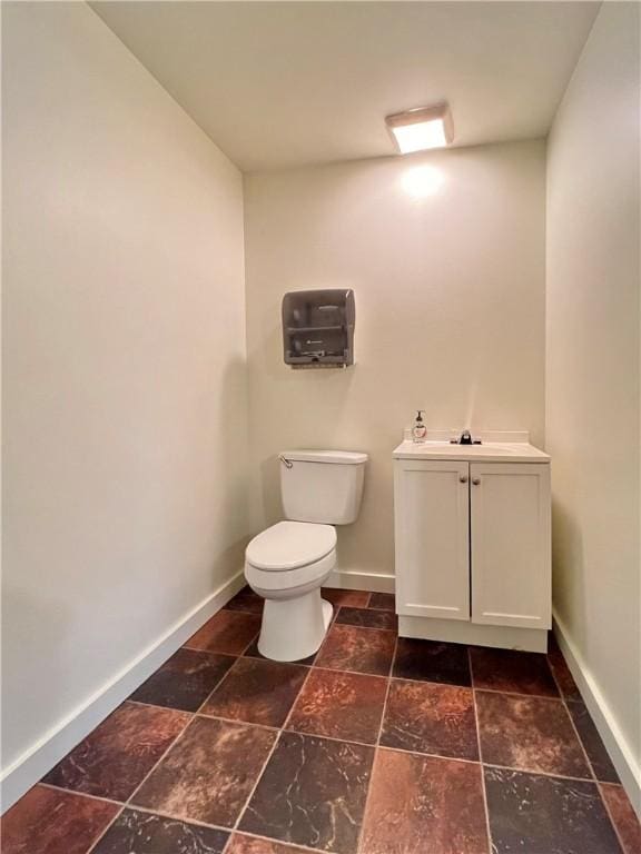 bathroom with toilet and sink