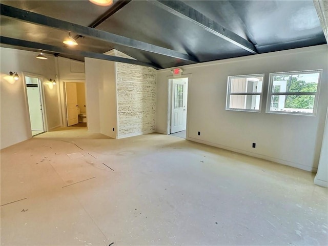 426 Van Buren, Eureka Springs, AR 72632 - unfurnished room featuring plenty of natural light and vaulted ceiling