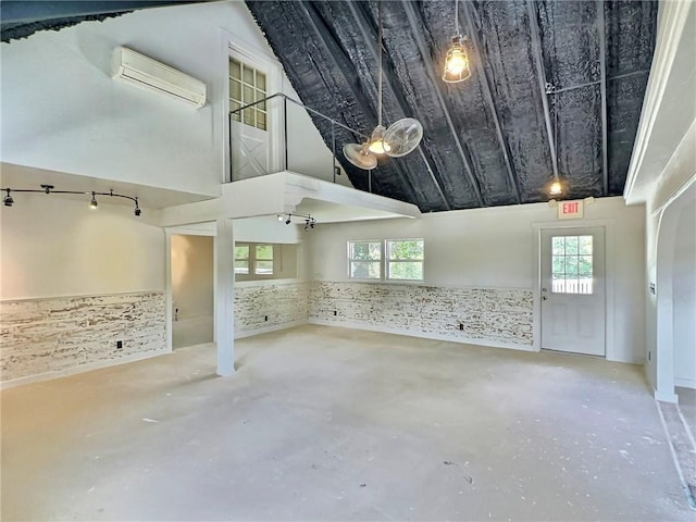 426 Van Buren, Eureka Springs, AR 72632 - garage featuring an AC wall unit