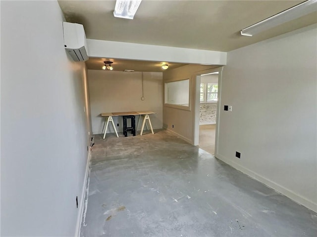 426 Van Buren, Eureka Springs, AR 72632 - unfurnished living room with an AC wall unit and unfinished concrete floors