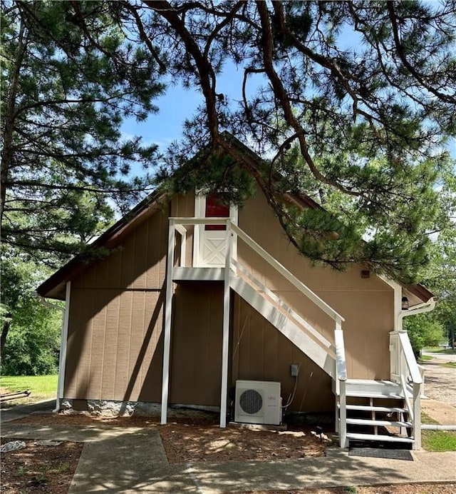426 Van Buren, Eureka Springs, AR 72632 - view of home's exterior featuring a cooling unit and a barn