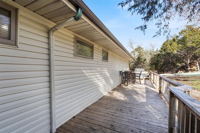 deck with outdoor dining space