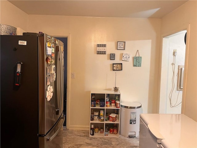 kitchen with stainless steel fridge