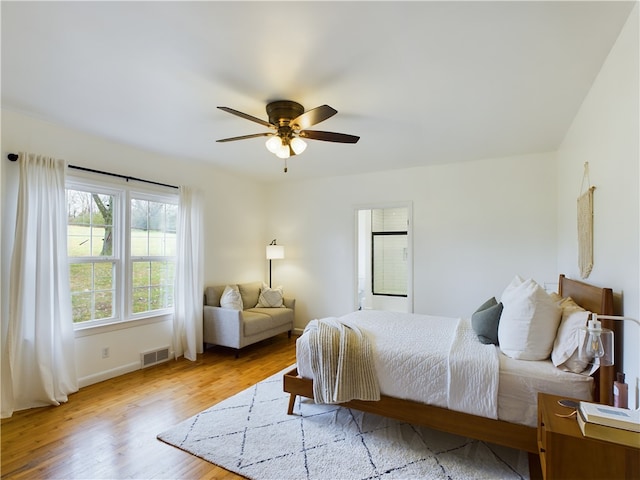 bedroom featuring ceiling fan and light wood-type flooring