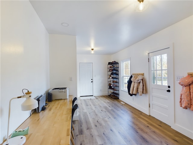 interior space with light hardwood / wood-style flooring