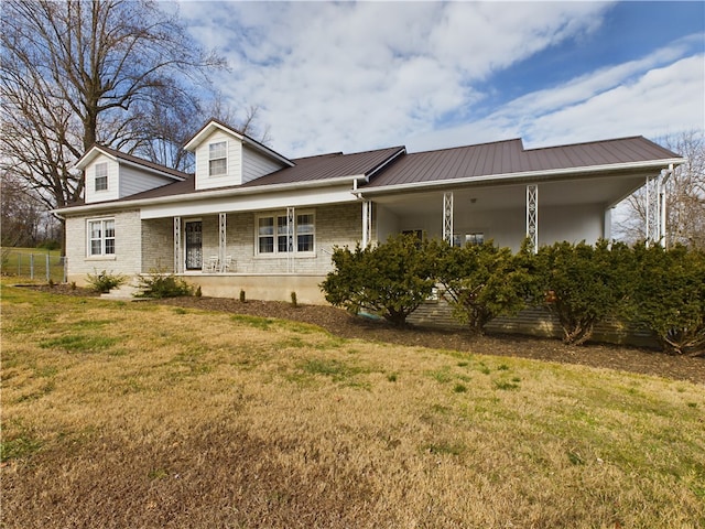 view of front facade with a front yard and a porch