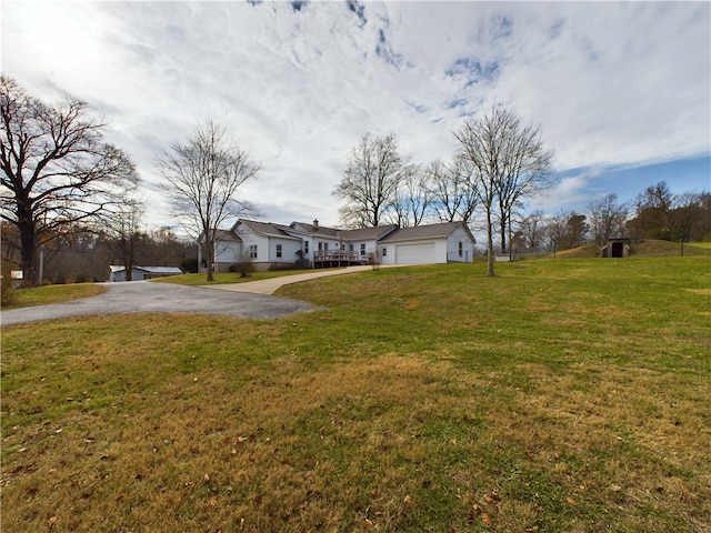 view of yard featuring a garage