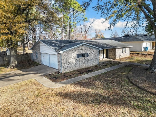 view of side of home with a garage