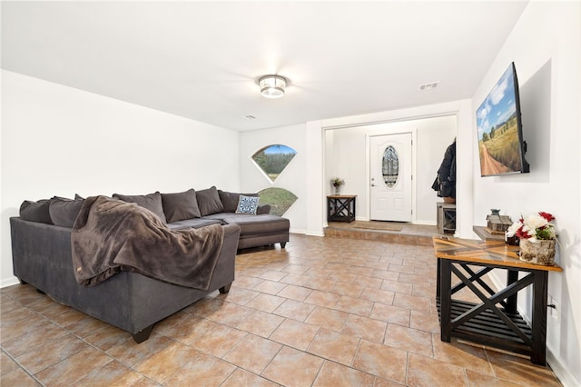 living room featuring light tile patterned floors