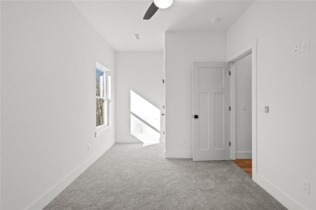8893 Williams Rd, Rogers, AR 72756 - spare room with carpet, a ceiling fan, and a smoke detector