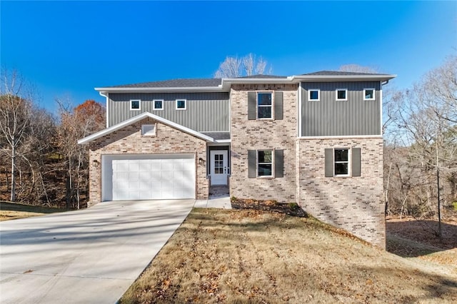 8893 Williams Rd, Rogers, AR 72756 - traditional-style house with brick siding, an attached garage, and driveway
