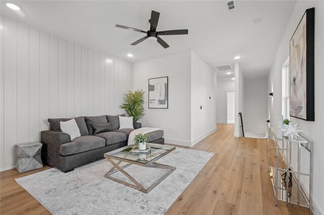 8893 Williams Rd, Rogers, AR 72756 - living area with light wood finished floors, a ceiling fan, and recessed lighting