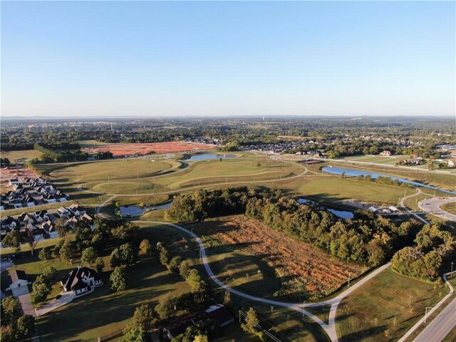 445 Fox Trl, Elm Springs, AR 72762 - aerial view with a water view, golf course view, and a residential view