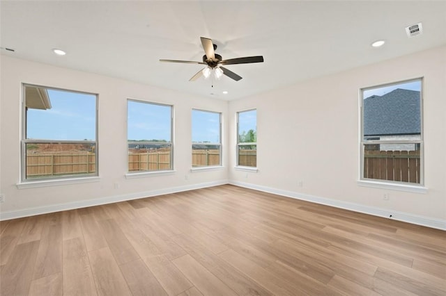 445 Fox Trl, Elm Springs, AR 72762 - spare room with a ceiling fan, visible vents, light wood-type flooring, baseboards, and recessed lighting