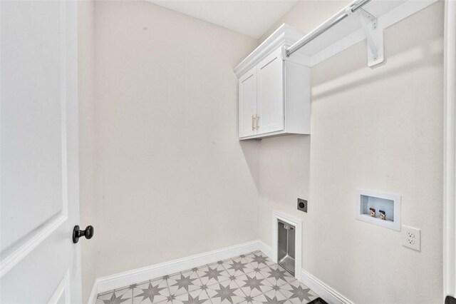 445 Fox Trl, Elm Springs, AR 72762 - laundry area with cabinet space, washer hookup, baseboards, light floors, and hookup for an electric dryer