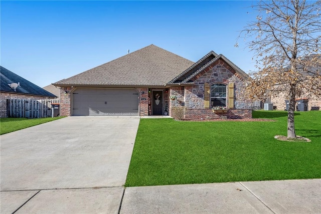 ranch-style house with a garage and a front lawn