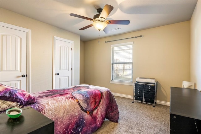 bedroom featuring light carpet and ceiling fan