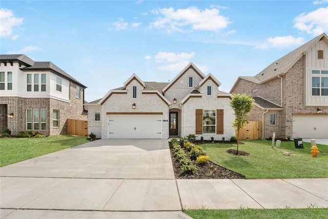 435 Fox Trl, Elm Springs, AR 72762 - view of front of property with driveway and a garage