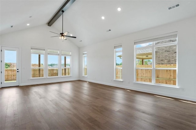 435 Fox Trl, Elm Springs, AR 72762 - unfurnished living room with beam ceiling, healthy amount of natural light, dark wood finished floors, ceiling fan, and baseboards
