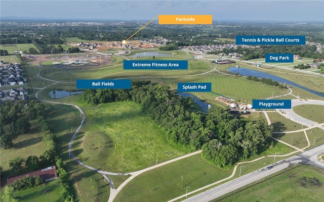 435 Fox Trl, Elm Springs, AR 72762 - aerial view of property and surrounding area with a nearby body of water