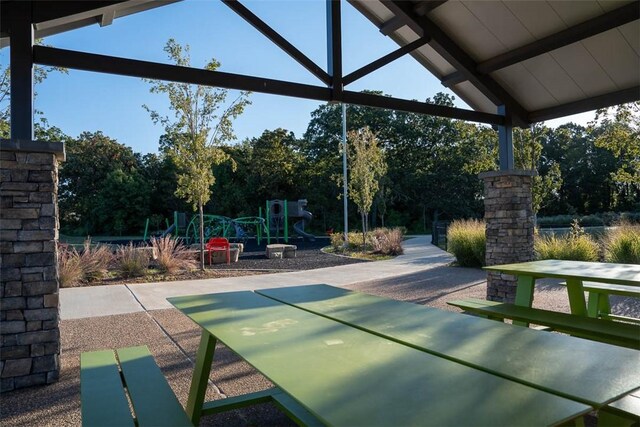 435 Fox Trl, Elm Springs, AR 72762 - view of patio featuring view of scattered trees