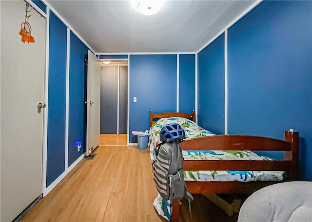 bedroom with wood-type flooring