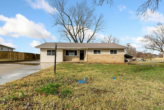 ranch-style home with a front lawn