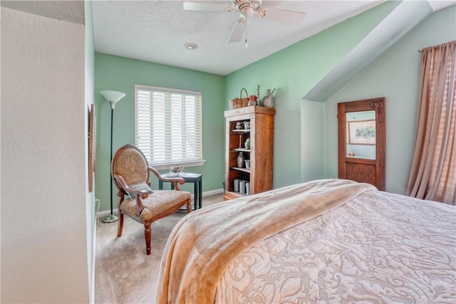 bedroom featuring light carpet and ceiling fan