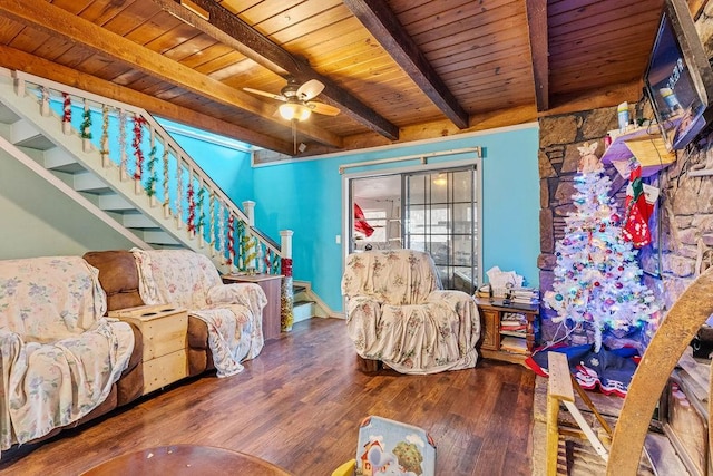 living room with a ceiling fan, wood ceiling, stairway, wood finished floors, and beamed ceiling