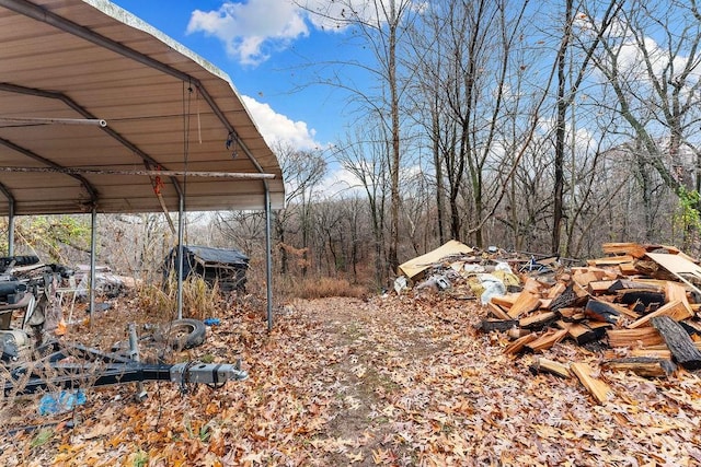 view of yard with a carport