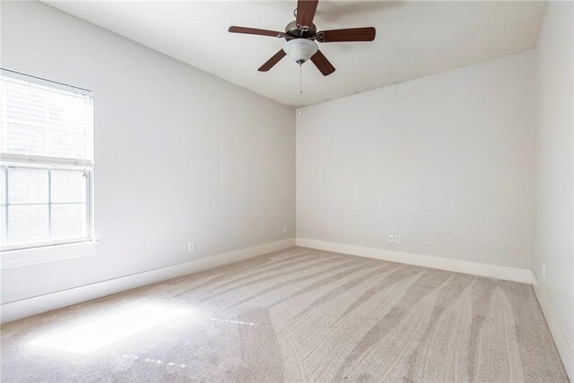 3706 Cherokee Rd, Rogers, AR 72758 - carpeted spare room featuring ceiling fan and baseboards