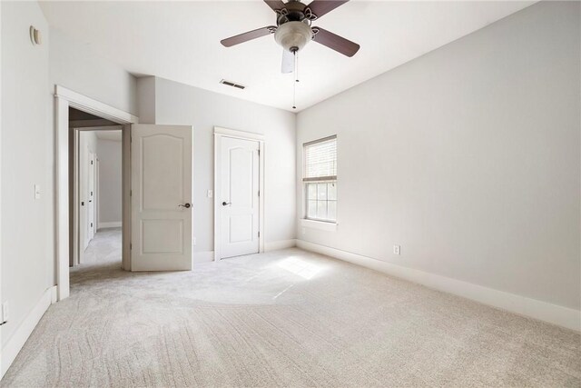 3706 Cherokee Rd, Rogers, AR 72758 - unfurnished bedroom with carpet floors, baseboards, visible vents, and a ceiling fan