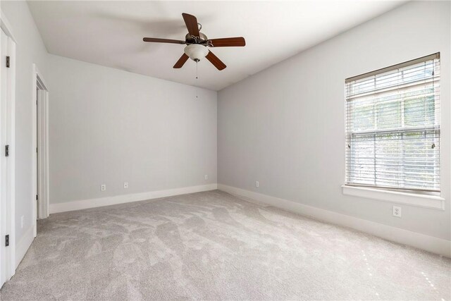 3706 Cherokee Rd, Rogers, AR 72758 - carpeted empty room with ceiling fan and baseboards