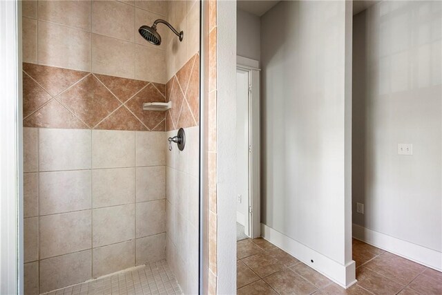 3706 Cherokee Rd, Rogers, AR 72758 - bathroom with tile patterned flooring, a shower stall, and baseboards